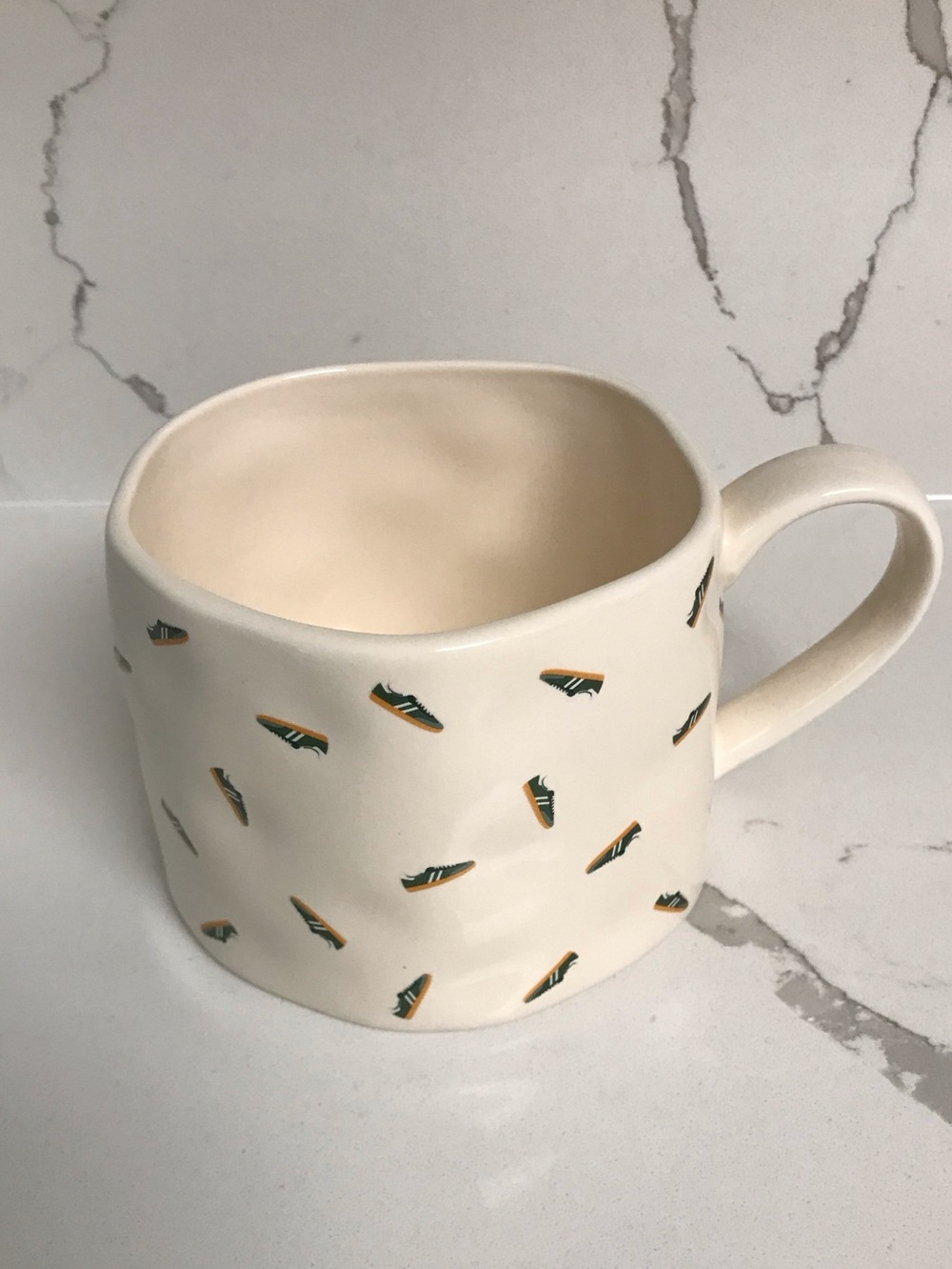 Cream Ceramic Coffee Mug with Green & Yellow Sneaker Pattern